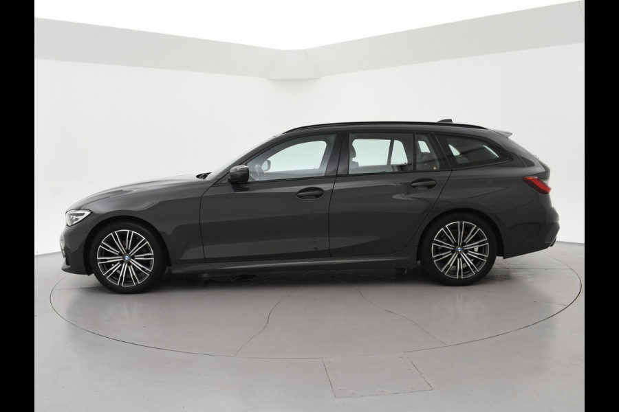 BMW 3 Serie Touring 318i AUT. M-SPORT DRAVITGRAU + SPORTSTOELEN | CAMERA | MEMORY | HIFI | SFEERVERLICHTING | CARPLAY