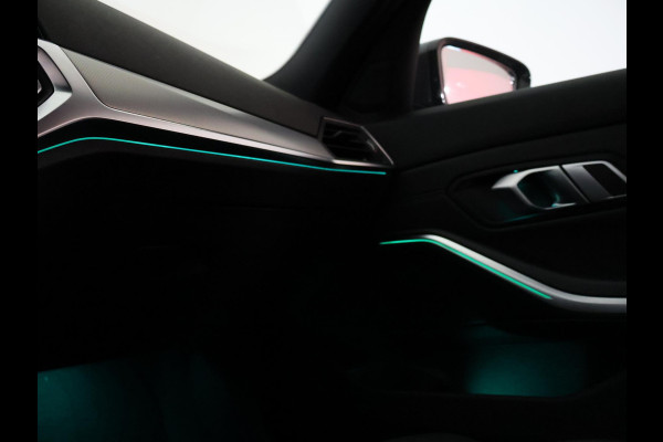 BMW 3 Serie Touring 318i AUT. M-SPORT DRAVITGRAU + SPORTSTOELEN | CAMERA | MEMORY | HIFI | SFEERVERLICHTING | CARPLAY