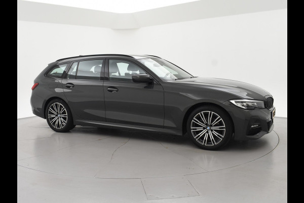 BMW 3 Serie Touring 318i AUT. M-SPORT DRAVITGRAU + SPORTSTOELEN | CAMERA | MEMORY | HIFI | SFEERVERLICHTING | CARPLAY