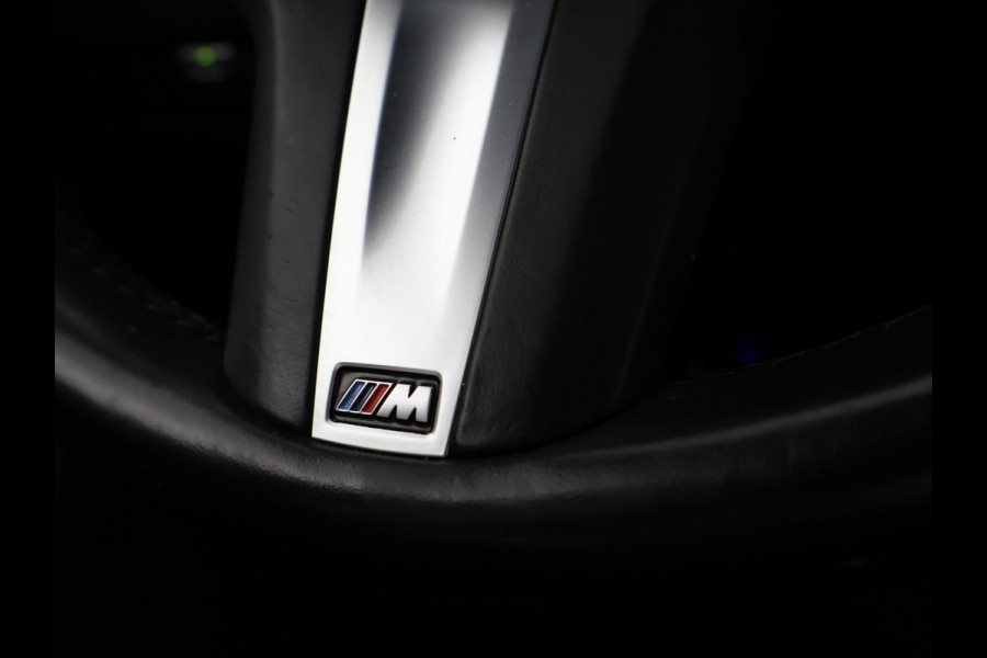 BMW 3 Serie Touring 318i AUT. M-SPORT DRAVITGRAU + SPORTSTOELEN | CAMERA | MEMORY | HIFI | SFEERVERLICHTING | CARPLAY