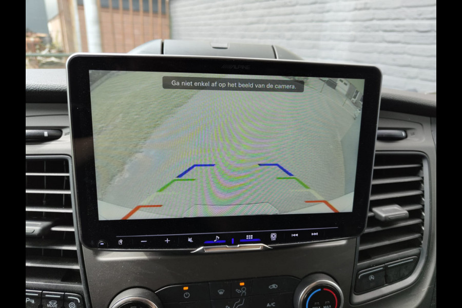 Ford Transit 2.0TDCI 130pk 350 L4H3 Navi Camera Pdc Apple Carplay Android WiFi Airco Cruise Control Voorruit-Verwarmd Regensensor DAB Schuifdeur Betonplex Vloer Wandbetimmering Roll Stability Control Led Spoorwisselassist Euro 6 Zeer Compleet!