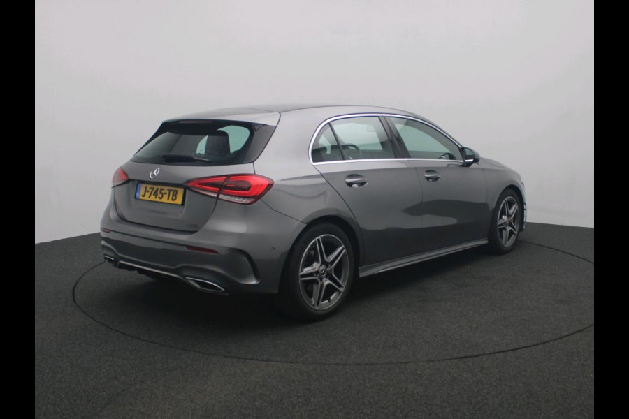 Mercedes-Benz A-Klasse 180 Business Solution AMG AMG Line | Achteruitrijcamera | Apple CarPlay | Spiegelpakket | Dodehoekassistent. Inclusief 48 maanden Mercedes-Benz Certified garantie voor Europa.