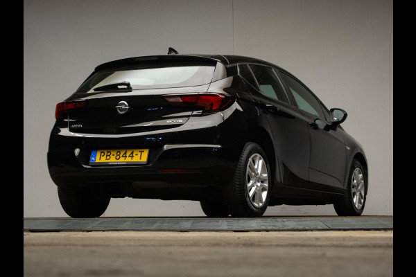Opel Astra 1.0 Online Edition Sport (APPLE CARPLAY, GROOT NAVI, PARKEERSENSOREN, LED, CRUISE, SPORTSTOELEN, NETTE STAAT)