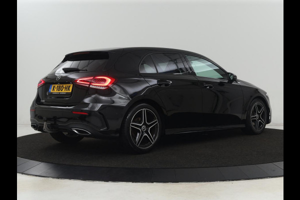 Mercedes-Benz A-Klasse 180 AMG | Adaptive cruise | Trekhaak | Stoelverwarming | Camera | Leder/Alcantara | Sfeerverlichting | Navigatie | Park Assist | Full LED | Climate control | Bluetooth
