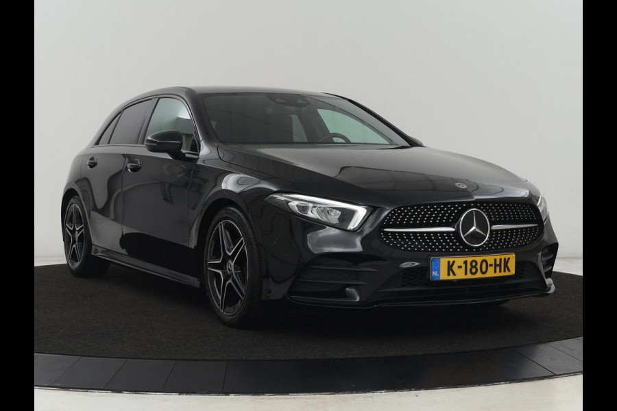 Mercedes-Benz A-Klasse 180 AMG | Adaptive cruise | Trekhaak | Stoelverwarming | Camera | Leder/Alcantara | Sfeerverlichting | Navigatie | Park Assist | Full LED | Climate control | Bluetooth