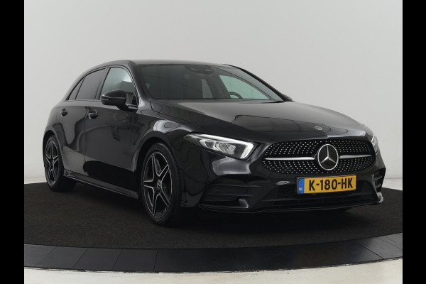 Mercedes-Benz A-Klasse 180 AMG | Adaptive cruise | Trekhaak | Stoelverwarming | Camera | Leder/Alcantara | Sfeerverlichting | Navigatie | Park Assist | Full LED | Climate control | Bluetooth