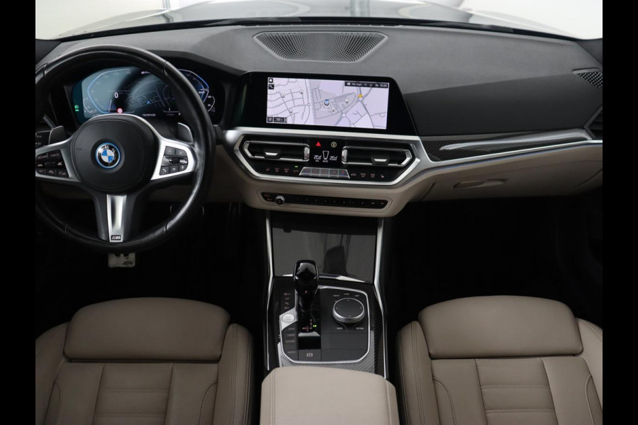 BMW 3-serie 320e M Sport | Adaptive cruise | Leder | Trekhaak | Stoelverwarming | 360 Camera | Laserlicht | Carplay | Sfeerverlichting | Live Cockpit | Keyless | Sportstoelen | DAB | Navigatie | PHEV | Plug In