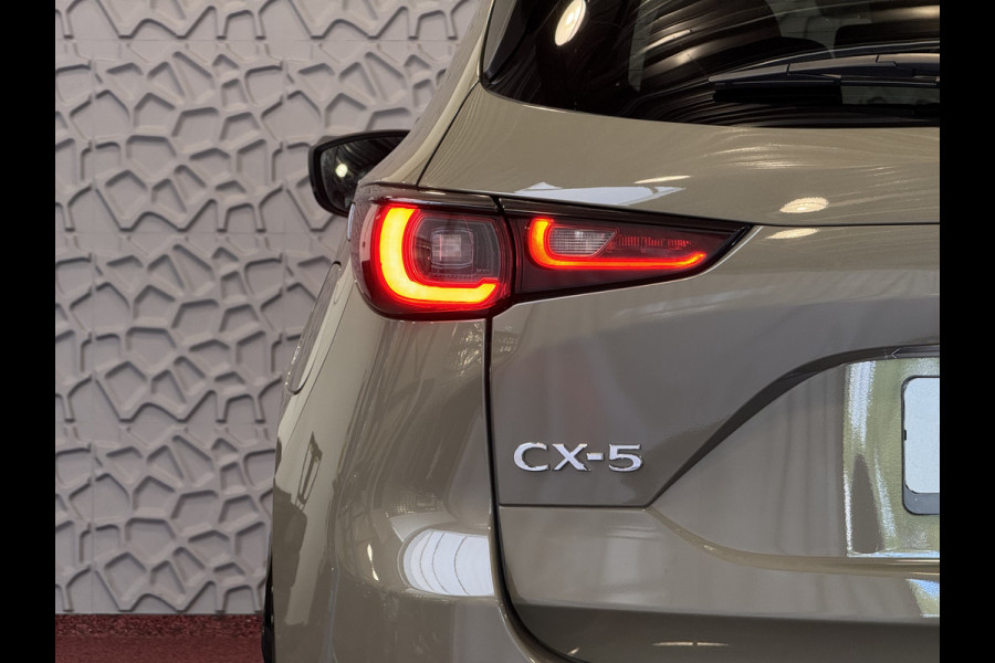 Mazda CX-5 2.0 E SkyActiv MHEV 165 HOMURA LEER/ALCANTARA ELEK.KLEP ADAP.CRUISE 19''LMV HEAD-UP 360.CAMERA FULL LED CARPLAY NAVI STOEL/STUUR 09/2024