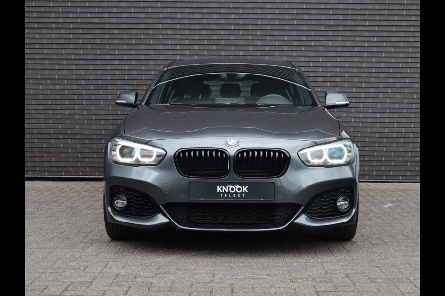 BMW 1-serie 118i High Executive M Sport Pakket Automaat 5 deurs / Navigatie Professional / Leder / 18 Inch / Shadow Line / Stoelverwarming / LED / Parkeersensoren voor+achter / Cruise Control / DAB / Lichtpakket