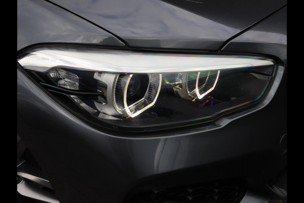 BMW 1-serie 118i High Executive M Sport Pakket Automaat 5 deurs / Navigatie Professional / Leder / 18 Inch / Shadow Line / Stoelverwarming / LED / Parkeersensoren voor+achter / Cruise Control / DAB / Lichtpakket