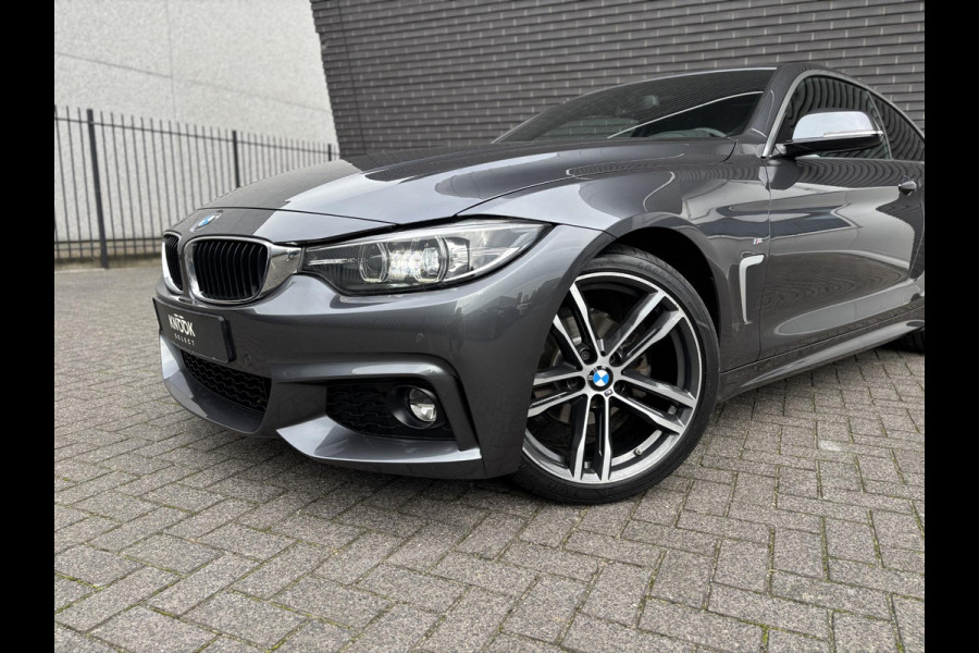 BMW 4 Serie Coupé 420i High Executive M Sport Pakket Automaat / Navigatie Professional / Leder / 19 Inch / Stoelverwarming / Multifunctioneel Instrumentendisplay / Shadow Line / Climate Control / Parkeersensoren voor+achter / Neerklapbare Achterbank