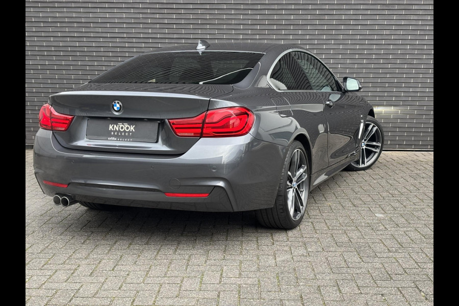 BMW 4 Serie Coupé 420i High Executive M Sport Pakket Automaat / Navigatie Professional / Leder / 19 Inch / Stoelverwarming / Multifunctioneel Instrumentendisplay / Shadow Line / Climate Control / Parkeersensoren voor+achter / Neerklapbare Achterbank