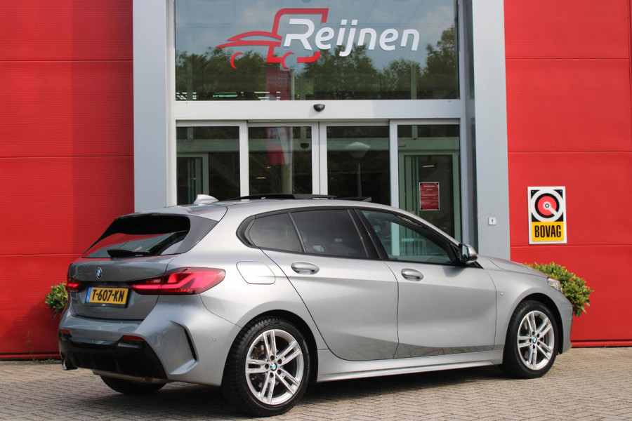 BMW 1-serie 118i 136PK M-SPORT EDITION | PANORAMISCH SCHUIF/KANTEL DAK |  SFEER VERLICHTING | SHADOW LINE PAKKET | LEDEREN BEKLEDING "DAKOTA GEPERFOREERD" | VERWARMBARE VOORSTOELEN | LEDEREN M-SPORT STUUR | NAVIGATIE | ACHTERUITRIJCAMERA | PARKEERSENSOREN VOOR EN ACHTER | ALARM | CLIMATE CONTROL | DRAADLOZE APPLE CARPLAY/ANDROID AUTO | LICHTMETALEN VELGEN M-SPORT | FULL LED KOPLAMPEN | LANE ASSIST | DAB+ RADIO | SPORT STOELEN | WARMTE WEREND GLAS  | EXTRA GETINTE ACHTERRUITEN | ELEKTRISCH VERSTELBARE BUITENSPIEGELS | BUITENSPIEGELS VERWARMBAAR | ARMSTEUN ACHTER |BMW LIVE COCKPIT P