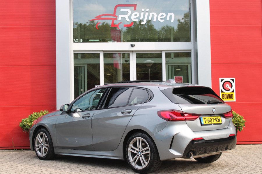 BMW 1-serie 118i 136PK M-SPORT EDITION | PANORAMISCH SCHUIF/KANTEL DAK |  SFEER VERLICHTING | SHADOW LINE PAKKET | LEDEREN BEKLEDING "DAKOTA GEPERFOREERD" | VERWARMBARE VOORSTOELEN | LEDEREN M-SPORT STUUR | NAVIGATIE | ACHTERUITRIJCAMERA | PARKEERSENSOREN VOOR EN ACHTER | ALARM | CLIMATE CONTROL | DRAADLOZE APPLE CARPLAY/ANDROID AUTO | LICHTMETALEN VELGEN M-SPORT | FULL LED KOPLAMPEN | LANE ASSIST | DAB+ RADIO | SPORT STOELEN | WARMTE WEREND GLAS  | EXTRA GETINTE ACHTERRUITEN | ELEKTRISCH VERSTELBARE BUITENSPIEGELS | BUITENSPIEGELS VERWARMBAAR | ARMSTEUN ACHTER |BMW LIVE COCKPIT P