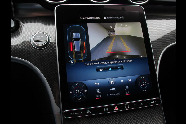 Mercedes-Benz C-Klasse Estate 200 AMG Line | Climate control | Achteruitrijcamera | Wegklapbare trekhaak | Navigatie | Dodehoek assistent | LED | Sfeerverlichting | Adaptieve cruise control | Verwarmde voorstoelen | Elektrische kofferbak