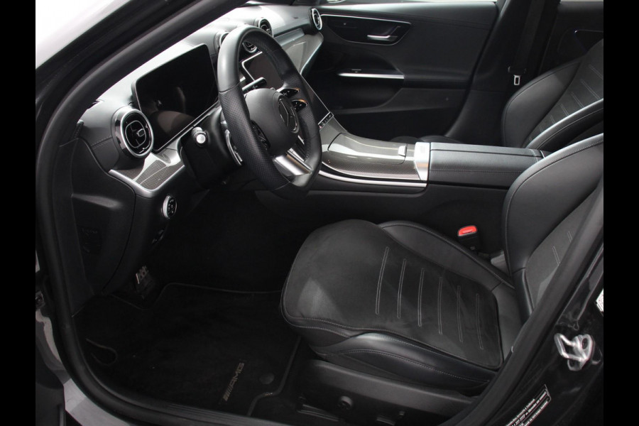 Mercedes-Benz C-Klasse Estate 200 AMG Line | Climate control | Achteruitrijcamera | Wegklapbare trekhaak | Navigatie | Dodehoek assistent | LED | Sfeerverlichting | Adaptieve cruise control | Verwarmde voorstoelen | Elektrische kofferbak