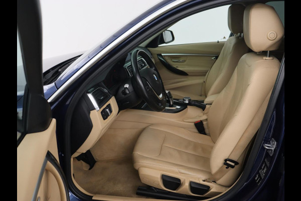 BMW 3 Serie 318i Luxury Edition | Leder | Stoelverwarming | Navigatie | Trekhaak | Full LED | Climate control | PDC | Cruise control