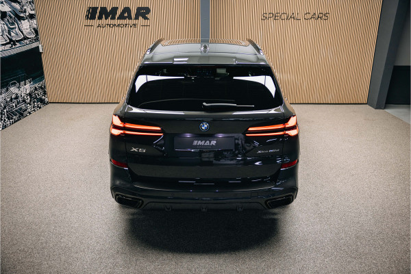 BMW X5 xDrive50e | Luxe stoelen | Luchtvering | Dravit Grau | Trekhaak | Stuur en stoelverwarming | Harman/Kardon |
