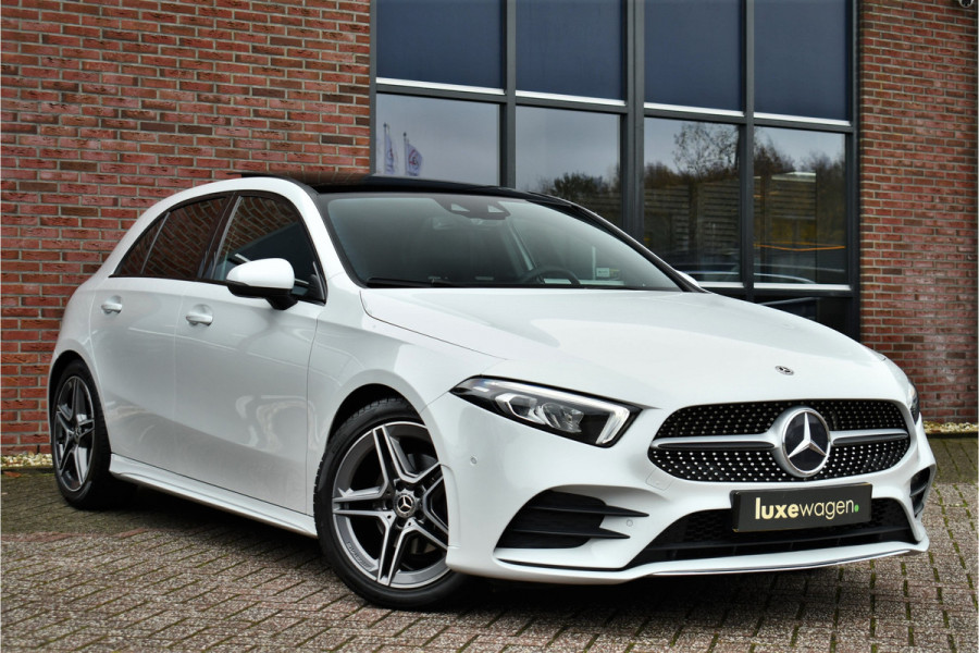 Mercedes-Benz A-Klasse 180 AMG Pano Trekhaak Camera Night Metallic-wit