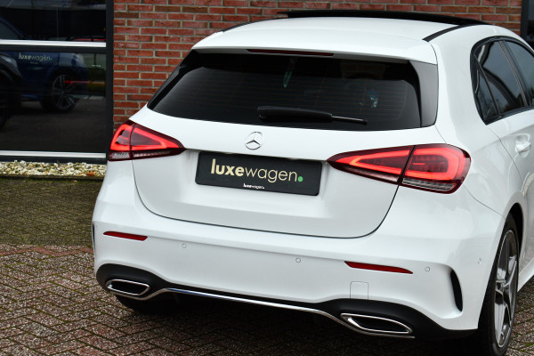 Mercedes-Benz A-Klasse 180 AMG Pano Trekhaak Camera Night Metallic-wit