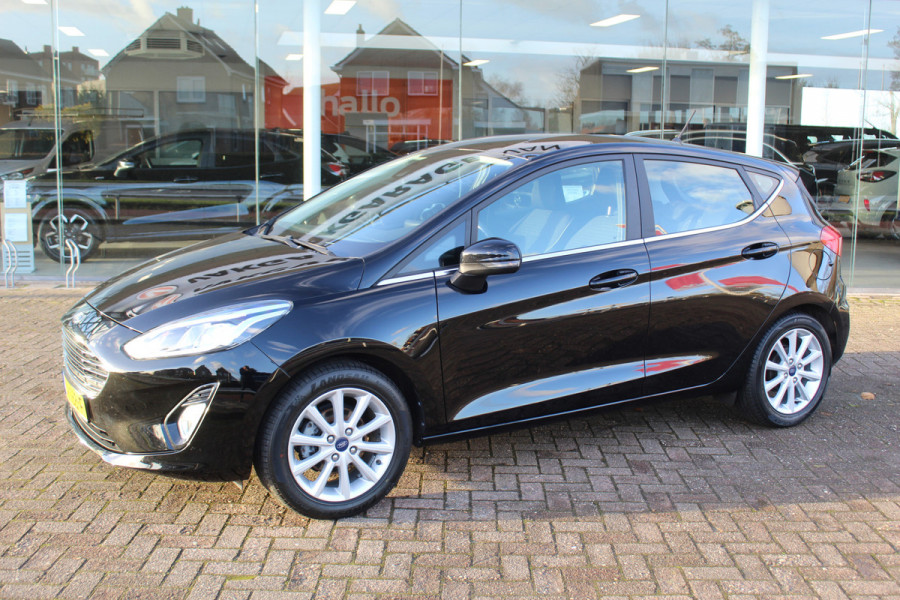 Ford Fiesta 1.0-100pk EcoBoost Titanium 5deurs Mooie en zuinige Ford Fiesta in de luxe Titanium uitvoering. Climate control , Cruise control , Navigatie , Bluetooth