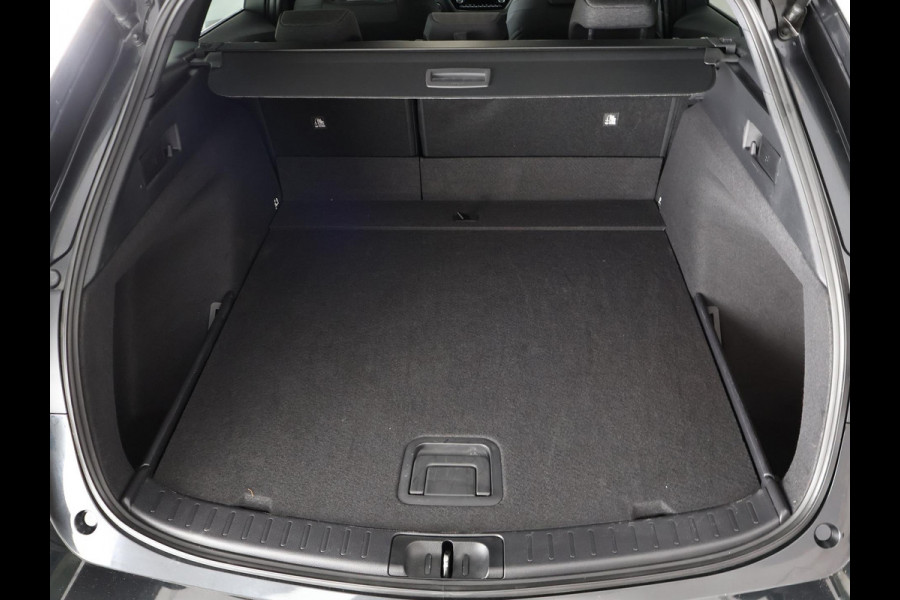 Toyota Corolla Touring Sports Hybrid 140 Business Luxury | Stuur- & Stoelverwarming | Parkeersensoren | Navigatie | Apple Carplay & AndroidAUTO |