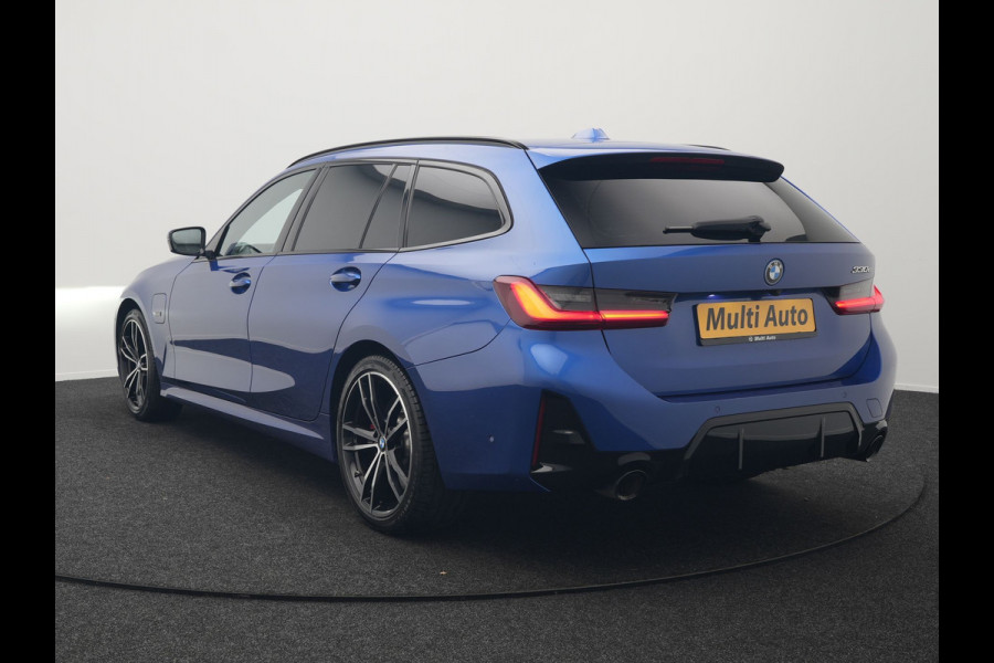 BMW 3 Serie Touring 330e M Sport Pro Plug In Hybrid 292pk Dealer O.H. PHEV | Widescreen Navi | Trekhaak Af Fabriek | Panodak | Adaptive Cruise | Camera |  Alcantara Sportstoelen Memory & Verwarmd | Sfeerverlichting | Apple Carplay | Stuur Verwarmd | Navigatie |