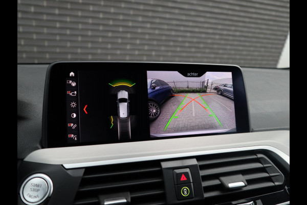 BMW X3 xDrive20i High Executive M Sport Pakket Automaat / Navigatiesysteem Professional / Trekhaak / Achteruitrijcamera / Leder / 20 Inch / Hifi / Shadow Line / Stoelverwarming / LED-koplampen / DAB+