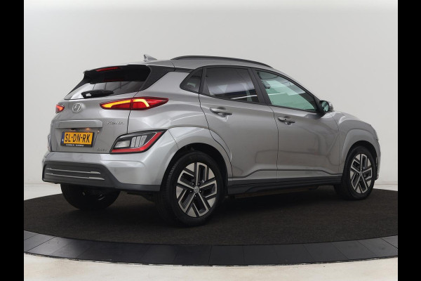 Hyundai Kona EV Fashion 64 kWh | Stoelverwarming | Head-Up | Camera | Carplay | Adaptive cruise | Navigatie | Keyless | Climate control