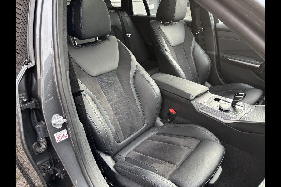 BMW 3 Serie Touring 330e High Executive M Sport Pakket Automaat / Panoramadak / Live Cockpit Professional / Stoelverwarming / Laser Light / 20" / M Performance Pack / Head-Up Display / Shadow Line / Extra Getint Glas