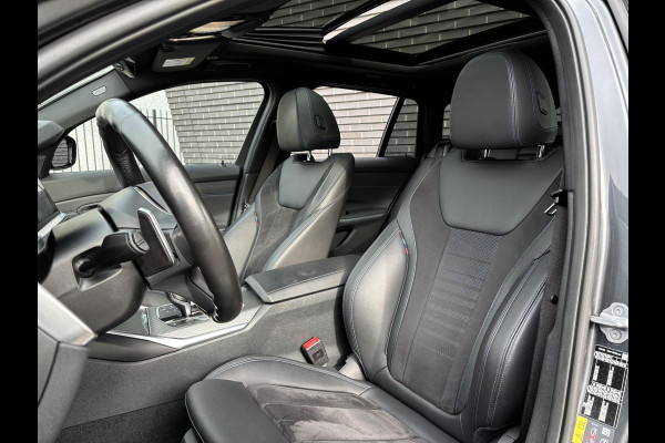BMW 3 Serie Touring 330e High Executive M Sport Pakket Automaat / Panoramadak / Live Cockpit Professional / Stoelverwarming / Laser Light / 20" / M Performance Pack / Head-Up Display / Shadow Line / Extra Getint Glas