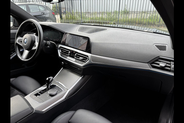 BMW 3 Serie Touring 330e High Executive M Sport Pakket Automaat / Panoramadak / Live Cockpit Professional / Stoelverwarming / Laser Light / 20" / M Performance Pack / Head-Up Display / Shadow Line / Extra Getint Glas