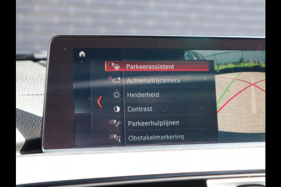 BMW 3 Serie Touring 320i High Executive M Sport Pakket Automaat / Panoramadak / Navigatie Professional / Leder / 19 Inch / Shadow Line / LED / Stoelverwarming / Lichtpakket / Achteruitrijcamera / Extra Getint Glas