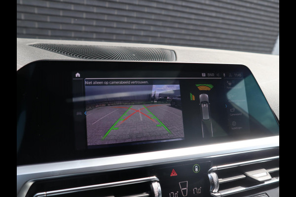 BMW 3 Serie Touring 320e xDrive High Executive M Sport Pakket Automaat / Live Cockpit Professional / Adaptief M Onderstel / Panoramadak / Stoelverwarming / Extra Getint Glas / LED / 19 Inch / Hifi / Lichtpakket