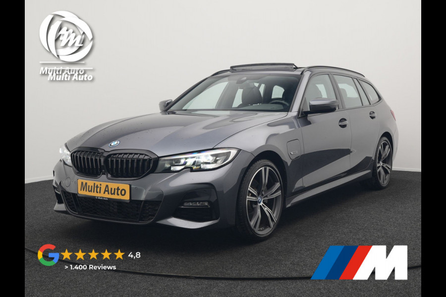 BMW 3 Serie Touring 320e M Sport Plug In Hybrid 204pk Dealer O.H. PHEV | Trekhaak Af Fabriek | Panodak | Camera | Adaptief Onderstel | 19"L.M | Alcantara Sportstoelen Memory & Verwarmd | Sfeerverlichting | Apple Carplay | Keyless | Navigatie | DAB |