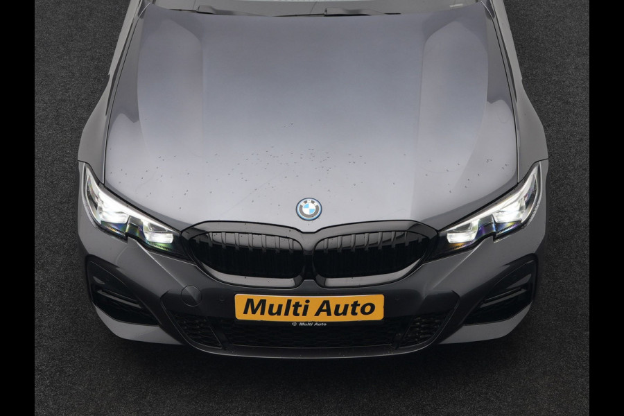 BMW 3 Serie Touring 320e M Sport Plug In Hybrid 204pk Dealer O.H. PHEV | Trekhaak Af Fabriek | Panodak | Camera | Adaptief Onderstel | 19"L.M | Alcantara Sportstoelen Memory & Verwarmd | Sfeerverlichting | Apple Carplay | Keyless | Navigatie | DAB |