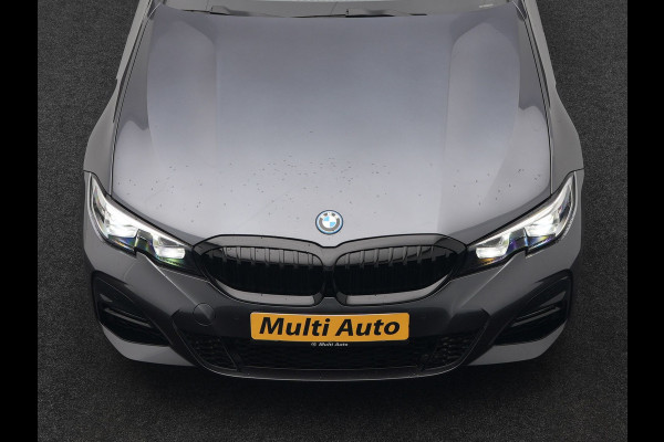 BMW 3 Serie Touring 320e M Sport Plug In Hybrid 204pk Dealer O.H. PHEV | Trekhaak Af Fabriek | Panodak | Camera | Adaptief Onderstel | 19"L.M | Alcantara Sportstoelen Memory & Verwarmd | Sfeerverlichting | Apple Carplay | Keyless | Navigatie | DAB |