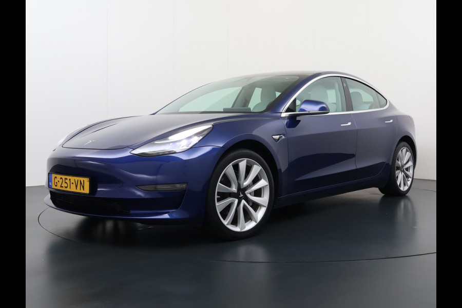 Tesla Model 3 Long Range AWD 75kWh SOH 88% 463PK Lmv 19" Ivoor Premium Audio AutoPilot Panoramadak Camera's Leer Adaptive-Cruise-Control+Stop& 4WD Stoel en achterbank verwarming Elektr.Stoelen+Memory+Easy-Entry WiFi Origineel Nederlandse Auto Garantie op Accu/Motor tot 20-12-2027/192.000km