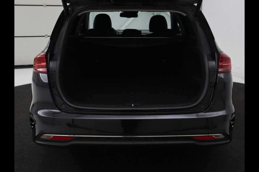 Kia Ceed 1.0 T-GDi DynamicPlusLine | Stoel & stuurverwarming | Trekhaak | Adaptive cruise | Camera | Carplay | Half leder | Navigatie | Keyless | Full LED | Climate control | Parkeerhulp