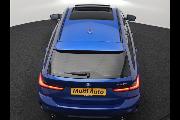 BMW 3 Serie Touring 330e M Sport Plug in Hybrid 293pk Dealer O.H PHEV | Panodak | Adaptive Onderstel | Laser LED | Alcantara Sportstoelen Memory | Head Up | Camera | 19"L.M | Keyless | Apple Carplay | Navigatie | Virtual | DAB |