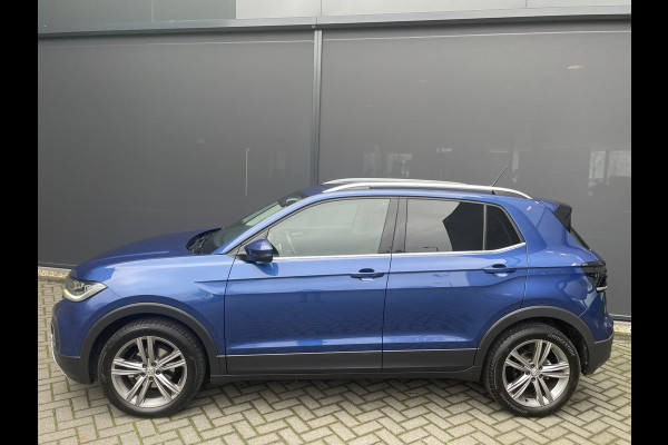 Volkswagen T-Cross Automaat 1.5 TSI Style Business R design automaat Airco - Cruise control - Parkeersensoren voor en achter - Navigatie - Dakrails - Bluetooth - Dodehoek detector - Stuur leder - Stuur multifunctioneel - Start/stop systeem - Radio - Licht metalen velgen 17 inch