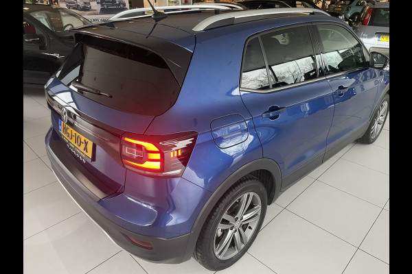 Volkswagen T-Cross Automaat 1.5 TSI Style Business R design automaat Airco - Cruise control - Parkeersensoren voor en achter - Navigatie - Dakrails - Bluetooth - Dodehoek detector - Stuur leder - Stuur multifunctioneel - Start/stop systeem - Radio - Licht metalen velgen 17 inch