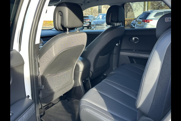 Hyundai IONIQ 5 Lounge AWD 77.4 kWh SOH 100% RIJKLAAR! | FABRIEKSGARANTIE HYUNDAI TOT 10-2028| |STOELVERWARMING + VENTILATIE| DEALER OH. |ELEK. ACHTERKLEP| BOSE AUDIO| VOL OPTIES| ACHTERBANK VERWARMD| HEAD-UP
