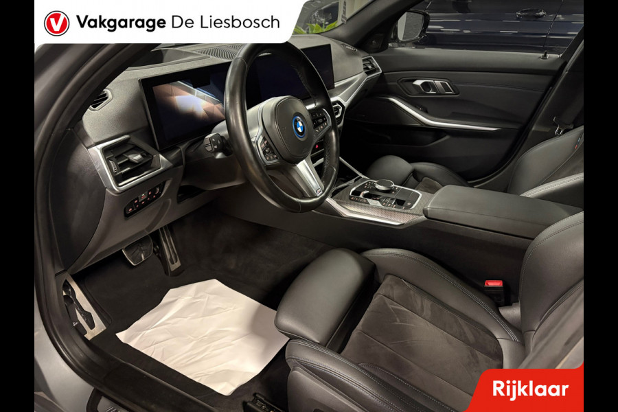 BMW 3 Serie Touring 330e xDrive M-pakket facelift / Panorama-dak / head-up / 360 camera / Harman-Kardon