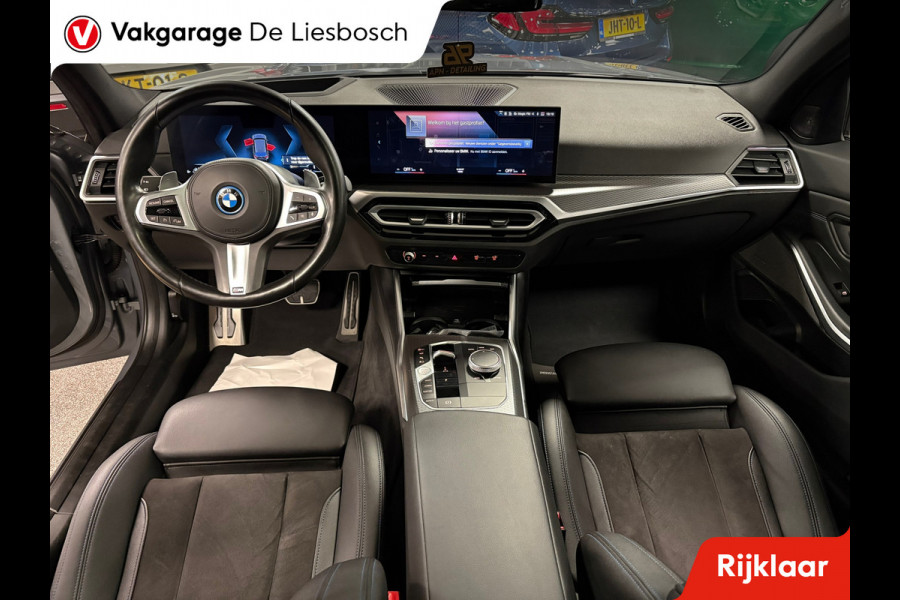 BMW 3 Serie Touring 330e xDrive M-pakket facelift / Panorama-dak / head-up / 360 camera / Harman-Kardon