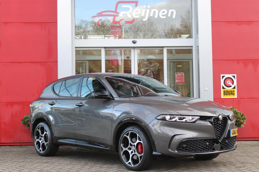 Alfa Romeo Tonale 1.5T 160PK Hybrid VELOCE | PREMIUM PACK: LEDEREN BEKLEDING/GEVENTILEERDE VOORSTOELEN/4-VOUDIG ELEKTRISCH VERSTELBARE LENDESTEUN VOORSTOELEN/HOOGGLANS ZWARTE RAAMOMLIJSTING/AMBIENT LIGHTING | TECHNOLOGY PACK: PARKEERWAARSCHUWING VOOR EN ACHTER/360° CAMERA/AUTOMATISCH INPARKEREN/ AUTONOMOUS DRIVING LEVEL 2: ADAPTIVE CRUISE CONTROL/LANE CENTERING ASSIST/TRAFFIC JAM ASSIST DODEHOEK DETECTIE AUTOMATISCH DIMMENDE BUITENSPIEGELS ELEKTRISCH BEDIENBARE ACHTERKLEP | WINTERPACK: STOELVERWARMING VOOR/STUURVERWARMING/VERWARMBARE RUITENSPROEIERS | 19" LICHTMETALEN VELGEN  | DRAADLOZ