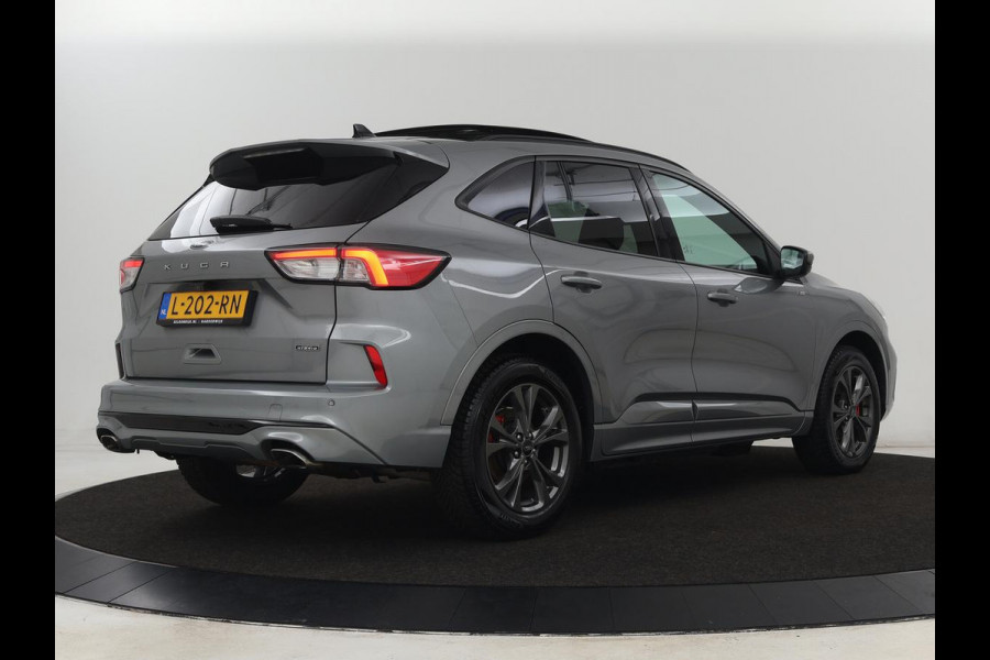 Ford Kuga 2.5 PHEV ST-Line | Panoramadak | Stoelverwarming | Camera | Carplay | Digital Cockpit | Navigatie | Keyless | DAB | Achterbankverwarming | Getint glas | Plug In