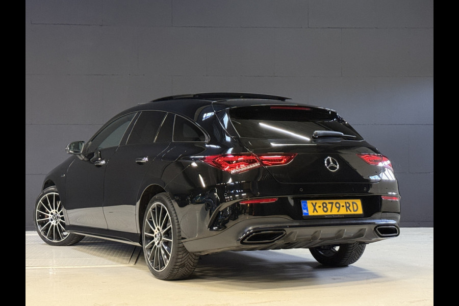Mercedes-Benz CLA-Klasse Shooting Brake 250 e AMG | Pano | Sfeerverlichting | Burmester | 360 Camera | Adaptive cruise | Elektr. stoelen + memory | Stoelverwarming | Full LED