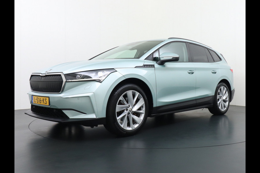 Škoda ENYAQ iV 60 180PK SOH 91% Apple Carplay Android NaviCamera 20" Matrix-Led Pdc-a+v Ecc Lmv Parkeerpakket Stoel+Stuurverwarming Comfortpakk Lichtpakket Dab Keyless advanced Bluetooth Cruise ControlRijstrooksensor Connected services Privacy Glas 1e Eigenaar Nieuwprijs €45.125 Origineel Nederlandse Auto