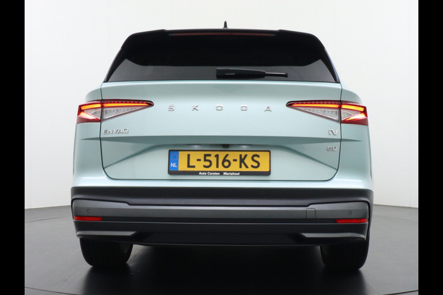 Škoda ENYAQ iV 60 180PK SOH 91% Apple Carplay Android NaviCamera 20" Matrix-Led Pdc-a+v Ecc Lmv Parkeerpakket Stoel+Stuurverwarming Comfortpakk Lichtpakket Dab Keyless advanced Bluetooth Cruise ControlRijstrooksensor Connected services Privacy Glas 1e Eigenaar Nieuwprijs €45.125 Origineel Nederlandse Auto